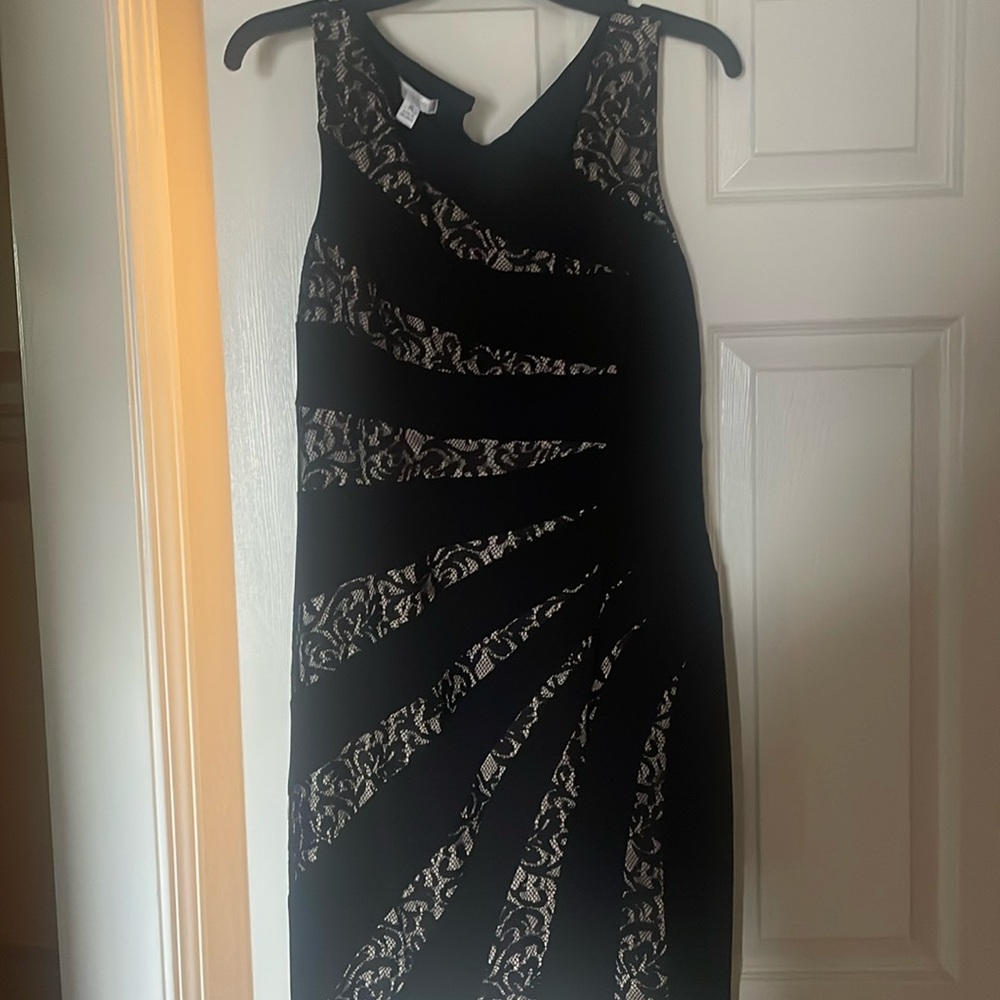 Knee length black and gold evening dress
